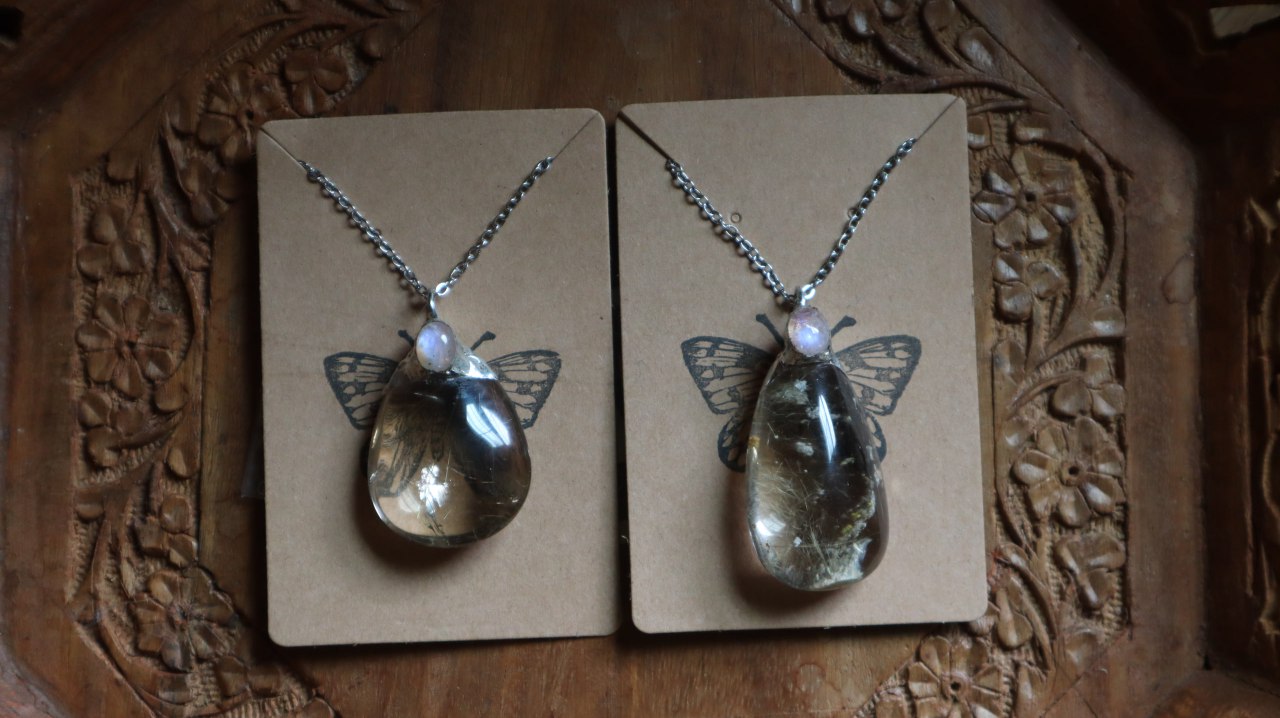 Rutilated Quartz Crystal with Moonstone Pendant